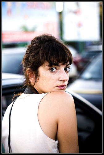 woman looking over shoulder